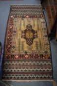 A Belouch rug, 163cm x 77cm.