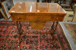A good Victorian burr walnut and marquetry inlaid combination games/work table.
