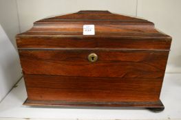 A Victorian rosewood sarcophagus shaped tea caddy.