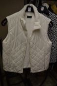 A Golfino quilted body warmer.