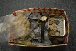 A large quantity of coins and two gents wristwatches.