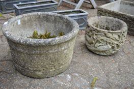 Two reconstituted stone planters.