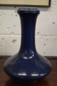 A large Chinese blue ground vase.