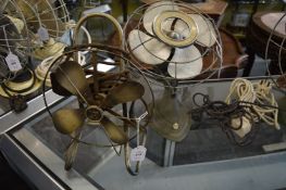 Two early electric fans.