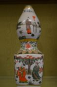 A large Chinese polychrome decorated gourd shaped vase.