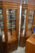 A pair of Chinese hardwood floor standing corner display units.