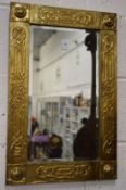 A good Arts and Crafts brass framed mirror.