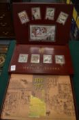 A boxed set of Chinese medallions.