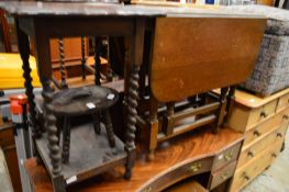 A stool and three tables.