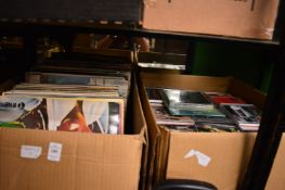 A quantity of records and CD's.