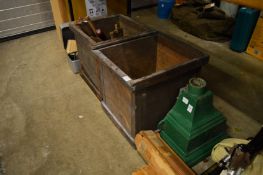 A cast iron rain water hopper, old wood working planes and other tools.