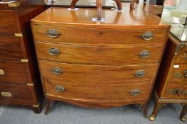 A George III mahogany bow front four drawer chest.
