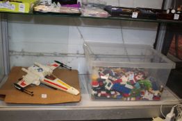 A Star Wars jet fighter by Kenner, General Mills Fun Group, 1978 together with a quantity of lego.