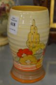 A Clarice Cliff Bizarre vase (cracked).