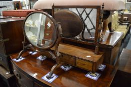 Two dressing table mirrors.