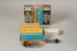 A G.E.C KT66 electronic valve, a Mullard EL34 valve and three boxes.