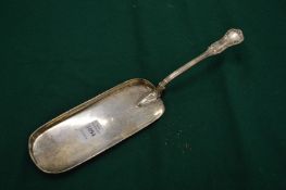 A silver crumb scoop (25).