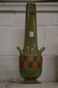 An unusual stylish Continental pottery twin handle vase.