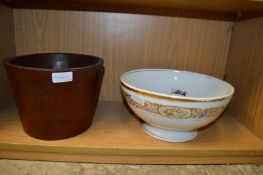 Porcelain bowl and a wooden jardiniere.