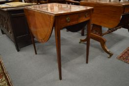 A good George III satinwood inlaid and banded oval Pembroke table with a drawer to one end on