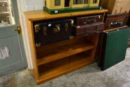 An oak open bookcase.