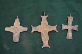 Bronze crucifixes.