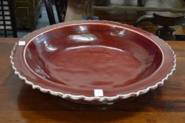 A large Chinese Sang de Boeuf dish.