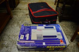 An alarm system and some suitcases.
