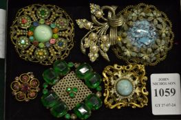 Decorative brooches.