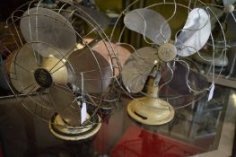 Two early Limit electric fans.