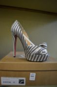 A pair of ladies Christian Louboutin Greissimo Pump Damas fabric high heeled shoes, size 38,