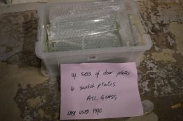 Quantity of glass door finger plates and light switch surrounds.