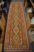 A good Kilim runner, 300cm x 83cm.