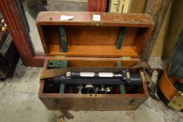 An old surveyors level, boxed complete with tripod etc.