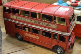 Tin plate model of a double decker bus.