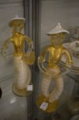 A pair of glass figures of a man and women, possible Murano (hands damaged).