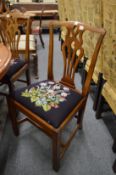 A set of six George III style mahogany dining chairs.