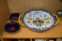 A Continental twin handled dish and a pair of other dishes.