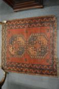 A small Tekke rug, 96cm x 91cm.