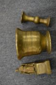 A bronze mortar and two other items.