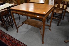 An oak single drawer side table.