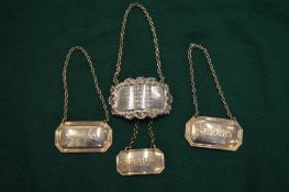 Various silver and other decanter labels.