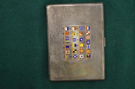 An engine turned silver cigarette case, the cover inlaid with enamelled A-Z flags.