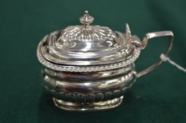 A Georgian silver mustard.