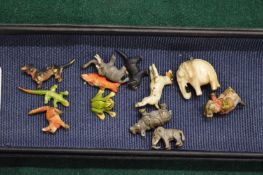 A group of miniature cold painted bronzes and other items.