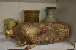 Study pottery vases and other items.