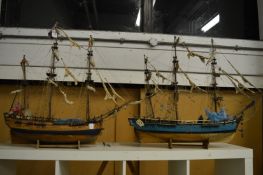 Two model boats.
