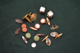 Various cufflinks.