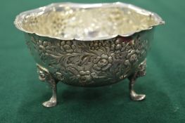 A Dublin silver small bowl with embossed decoration.