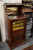 A Victorian mahogany music cabinet.